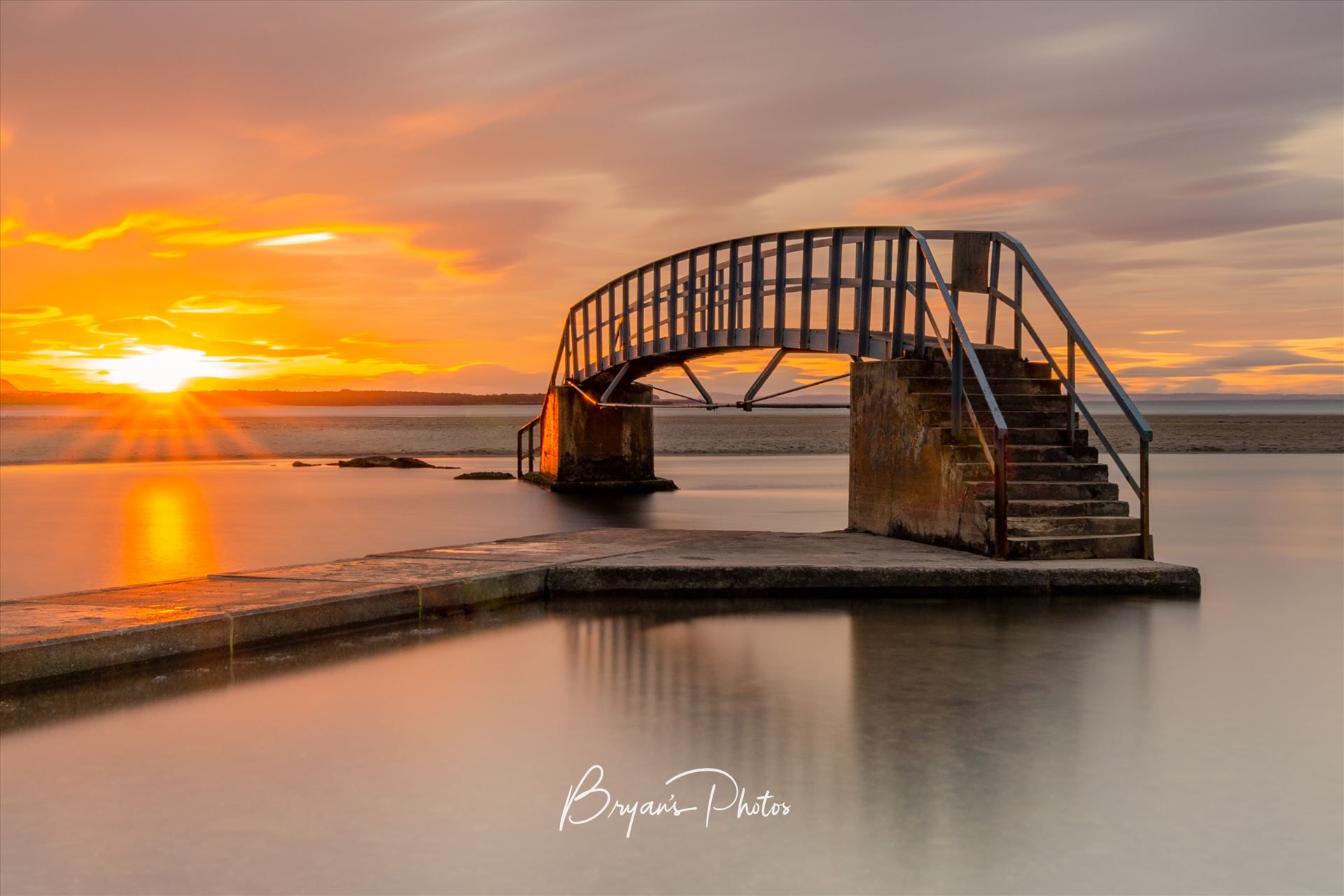 Belhaven Bridge Landscape - A photograph of the Belhaven Bridge at Dunbar taken at sunset. by Bryans Photos