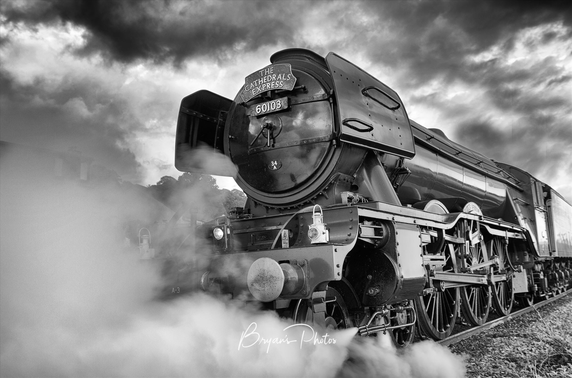 All steamed up - A black and white photograph of the world famous Flying Scotsman passing through Newmills as part of it's tour around Fife and Forth Valley. Not suitable for canvas wrap. by Bryans Photos