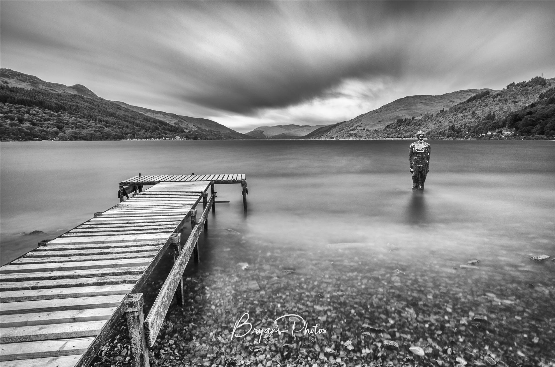 Loch Earn - A black and white long exposure photograph of Loch Earn taken from St Fillans. by Bryans Photos