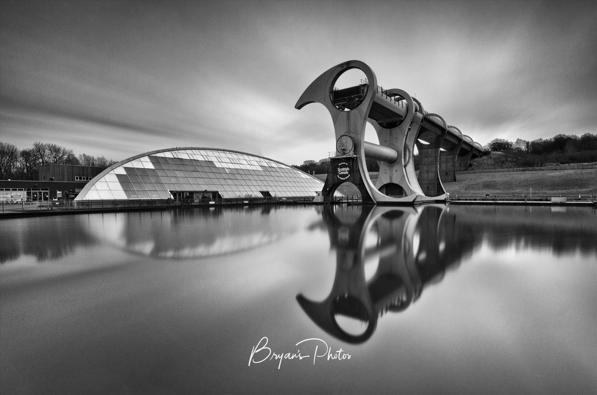 The Wheel - A black and white long exposure photograph of the famous Falkirk wheel. by Bryans Photos