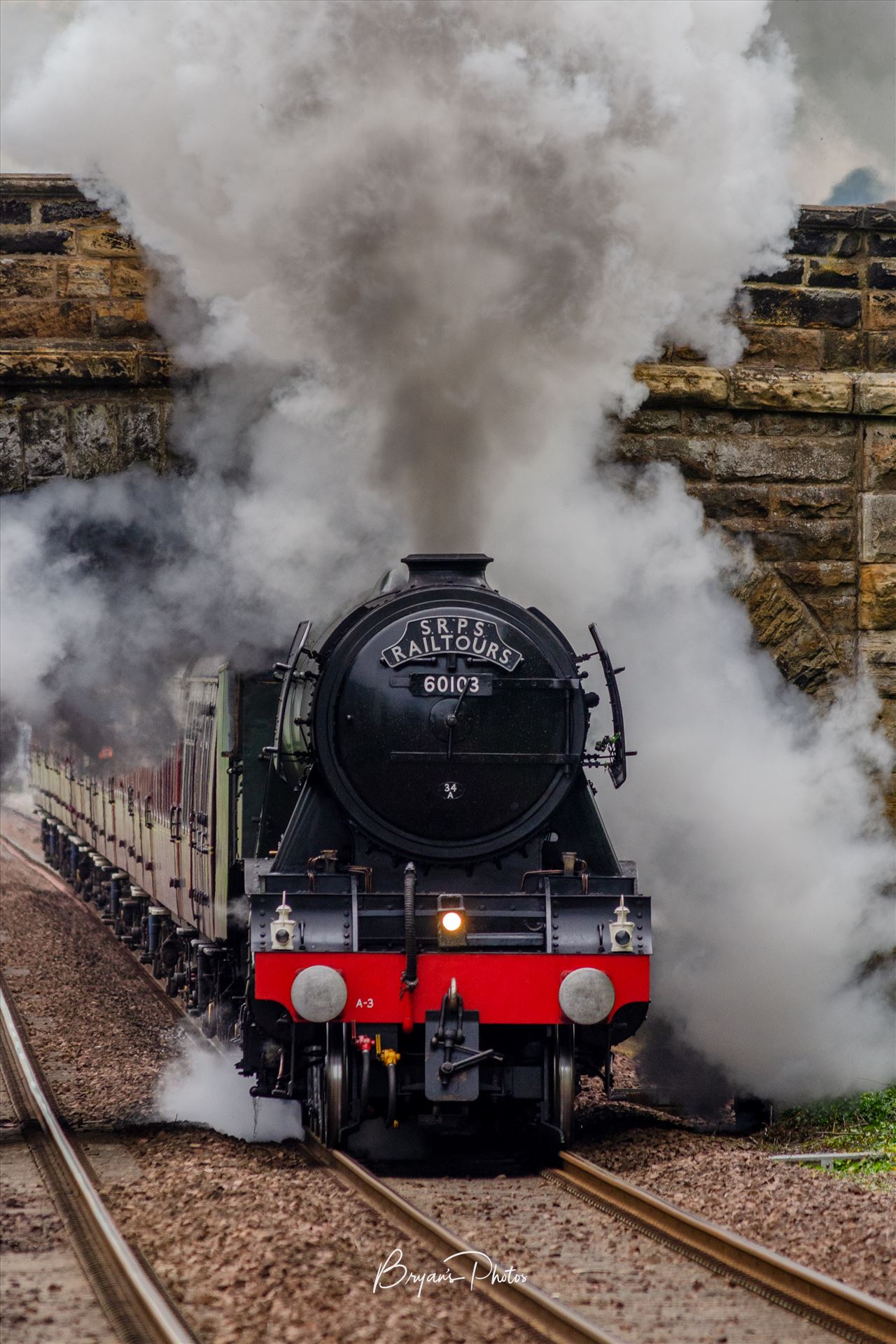 60103 The Flying Scotsman - A colour photograph of the Flying Scotsman under full steam approaching Dalgety Bay on the Fife circle. by Bryans Photos