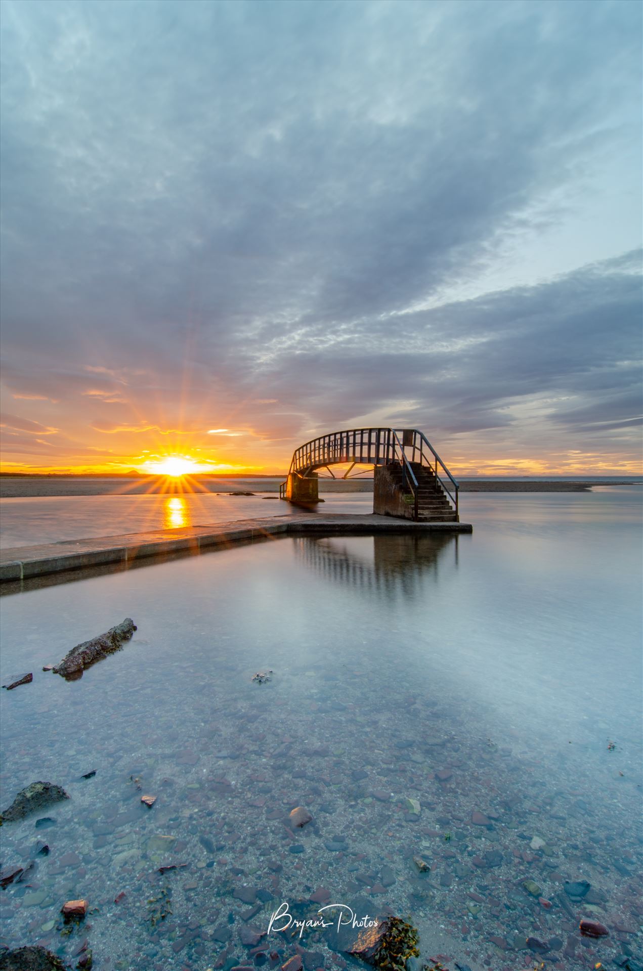 Belhaven Bridge Sunset - A photograph taken at sunset of the Belhaven Bridge. by Bryans Photos