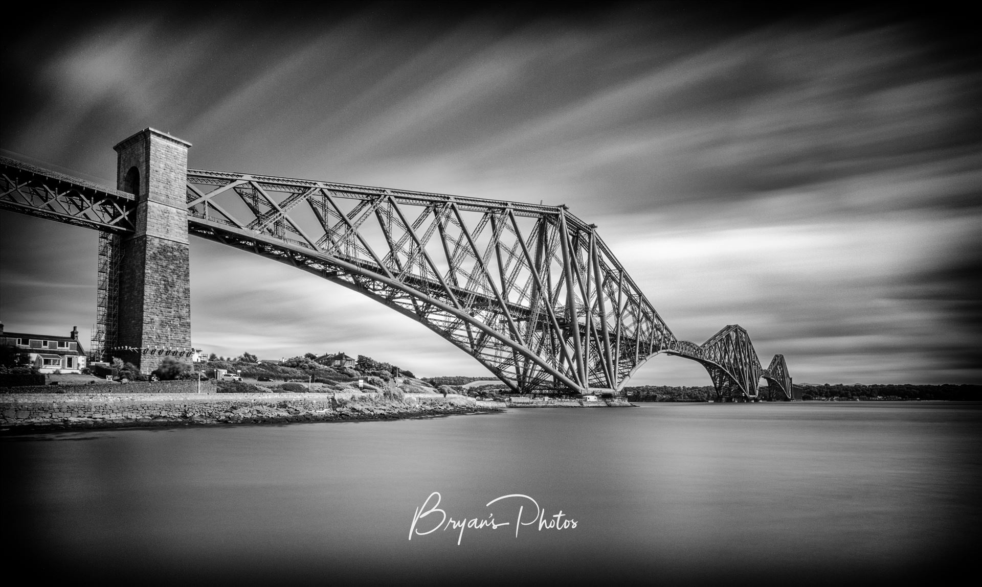 The Rail Bridge - A black and white long exposure photograph of the iconic Forth Rail Bridge taken from North Queensferry. by Bryans Photos