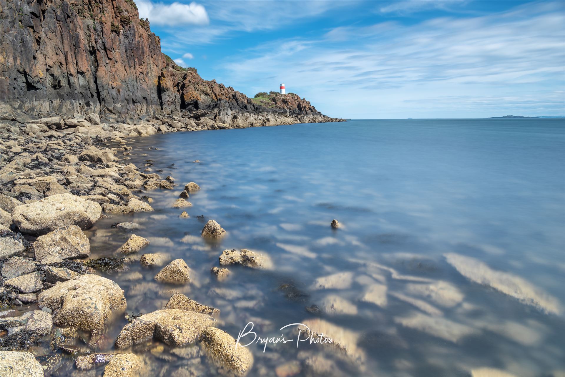 Blue Sky at Aberdour - A photograph taken on a sunny summer afternoon at Hawkcraig point Aberdour on the Fife coast. by Bryans Photos