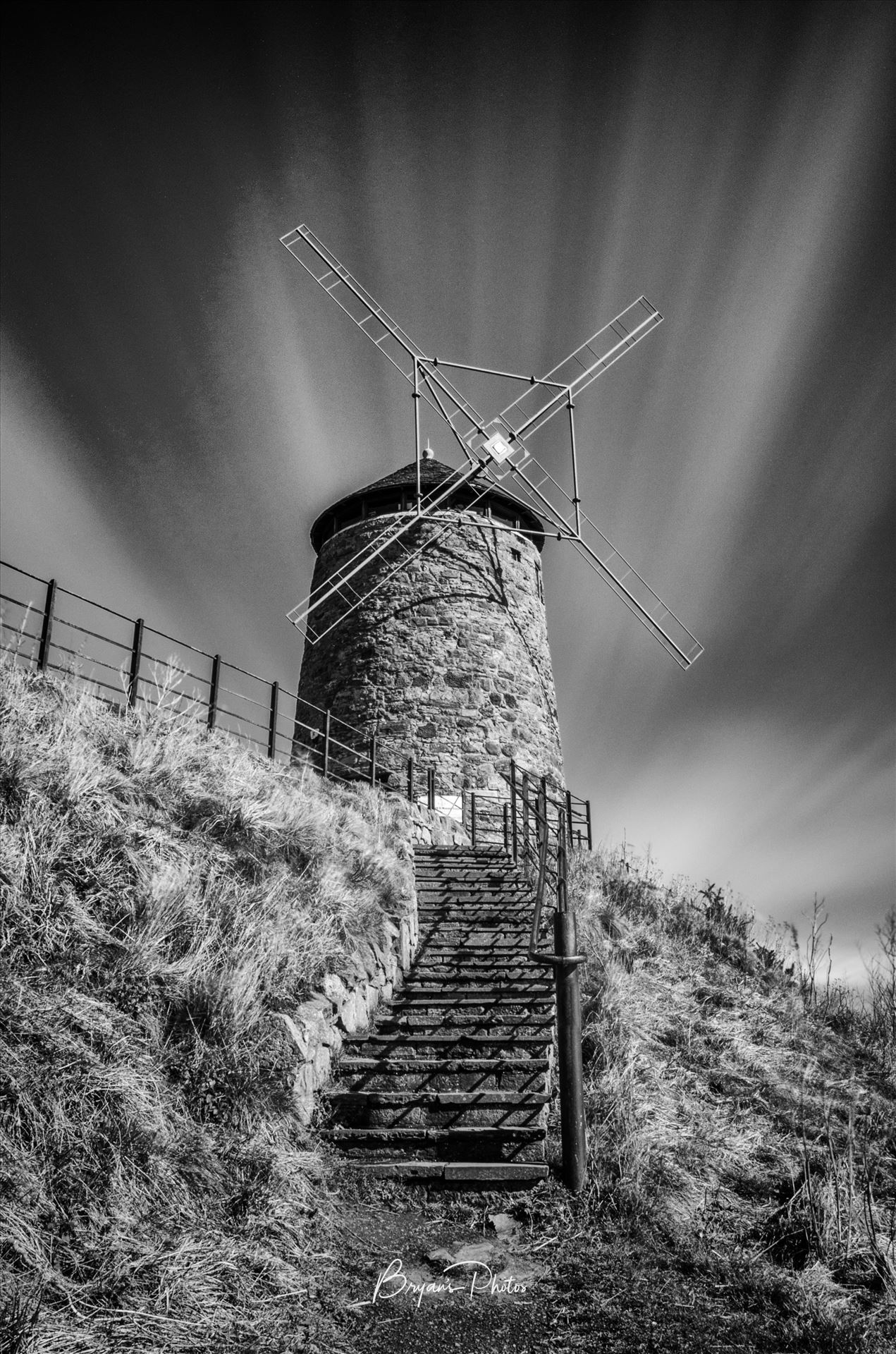 Windmill at St Monans - A black and white long exposure photograph of the windmill at St Monans on the Fife coast. by Bryans Photos