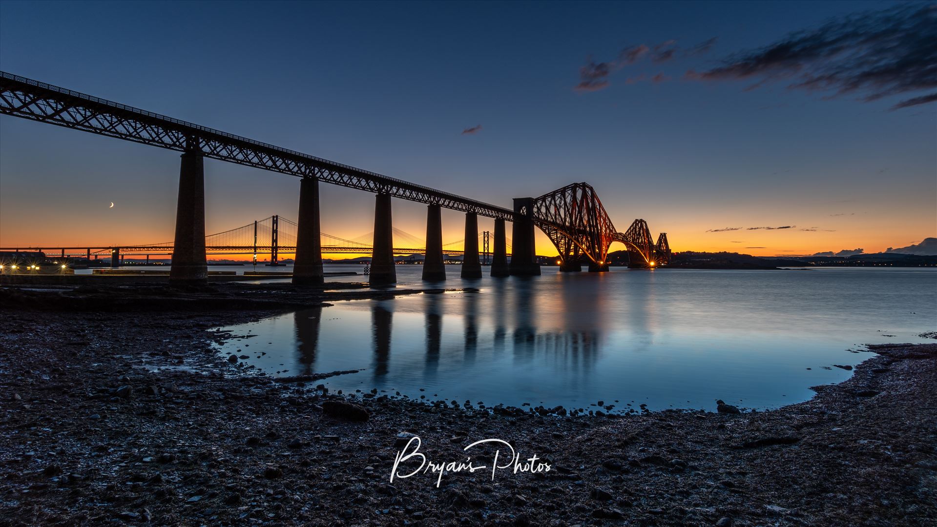 The Bridge After Sunset - A panoramic photograph of the Forth Rail Bridge taken after sunset from South Queensferry. by Bryans Photos