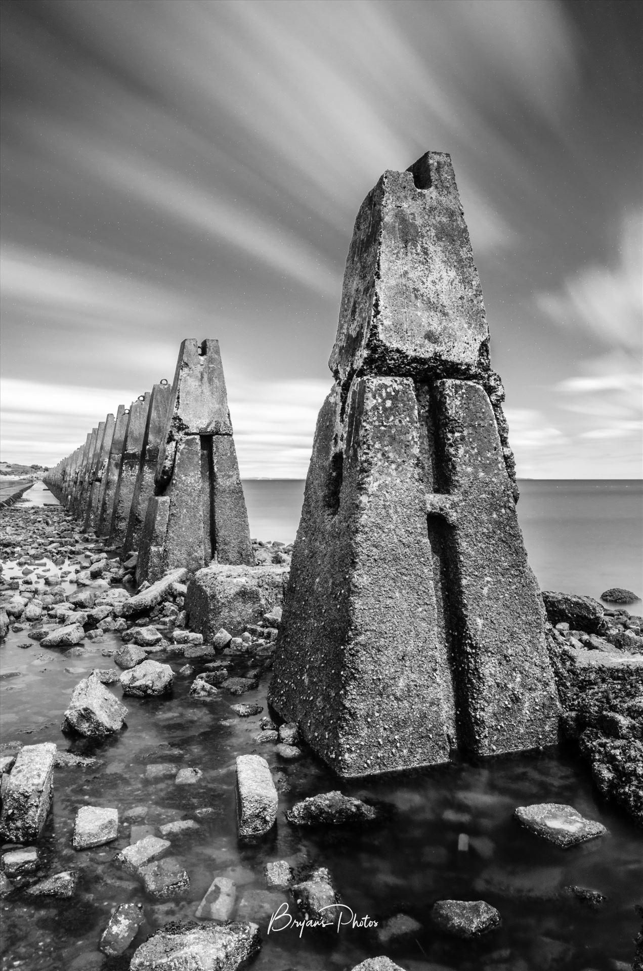 Cramond Portrait - A black and white long exposure photograph of the causeway to Cramond Island. by Bryans Photos