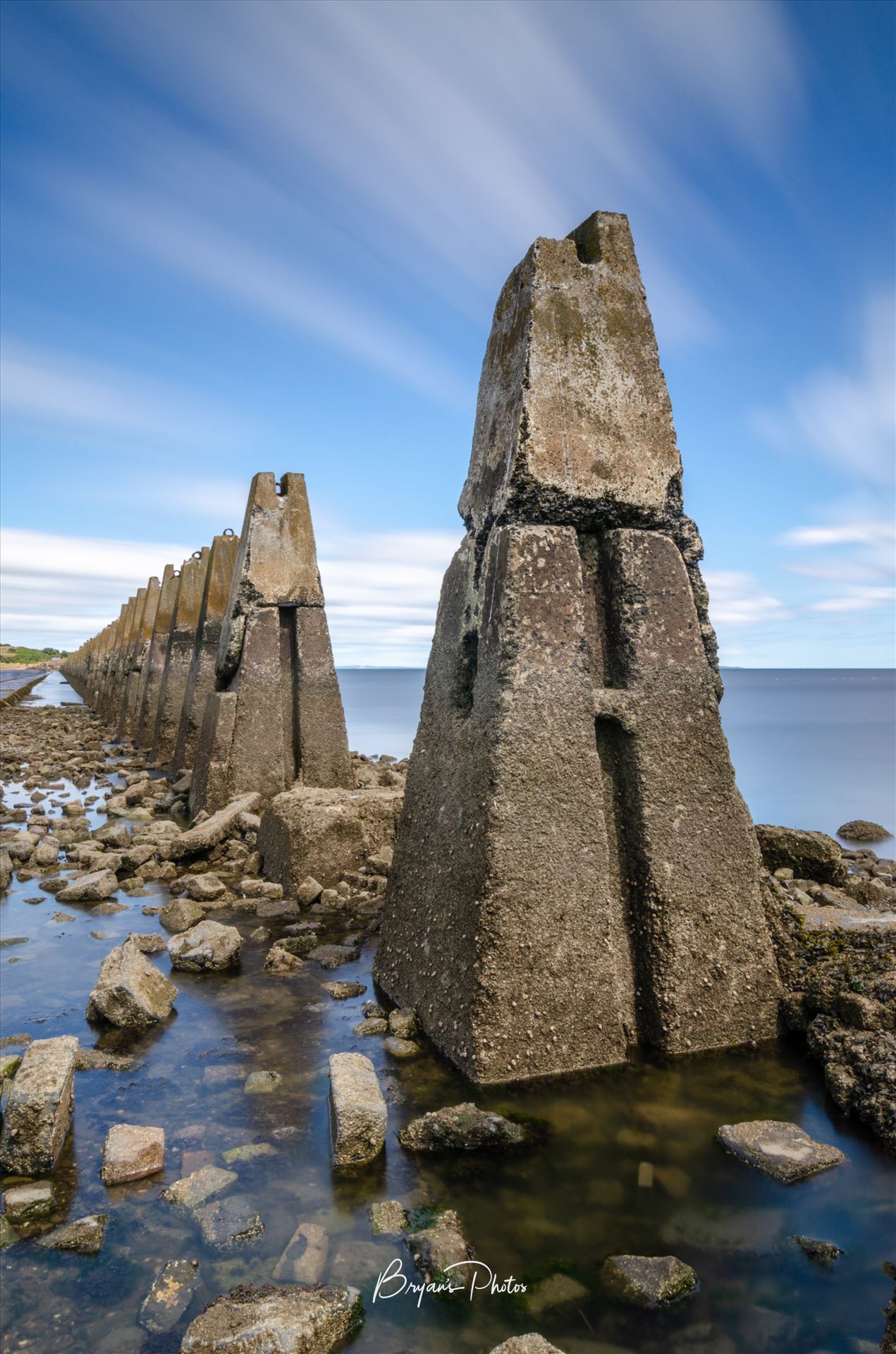 Cramond - A long exposure photograph of the causeway to Cramond Island. by Bryans Photos