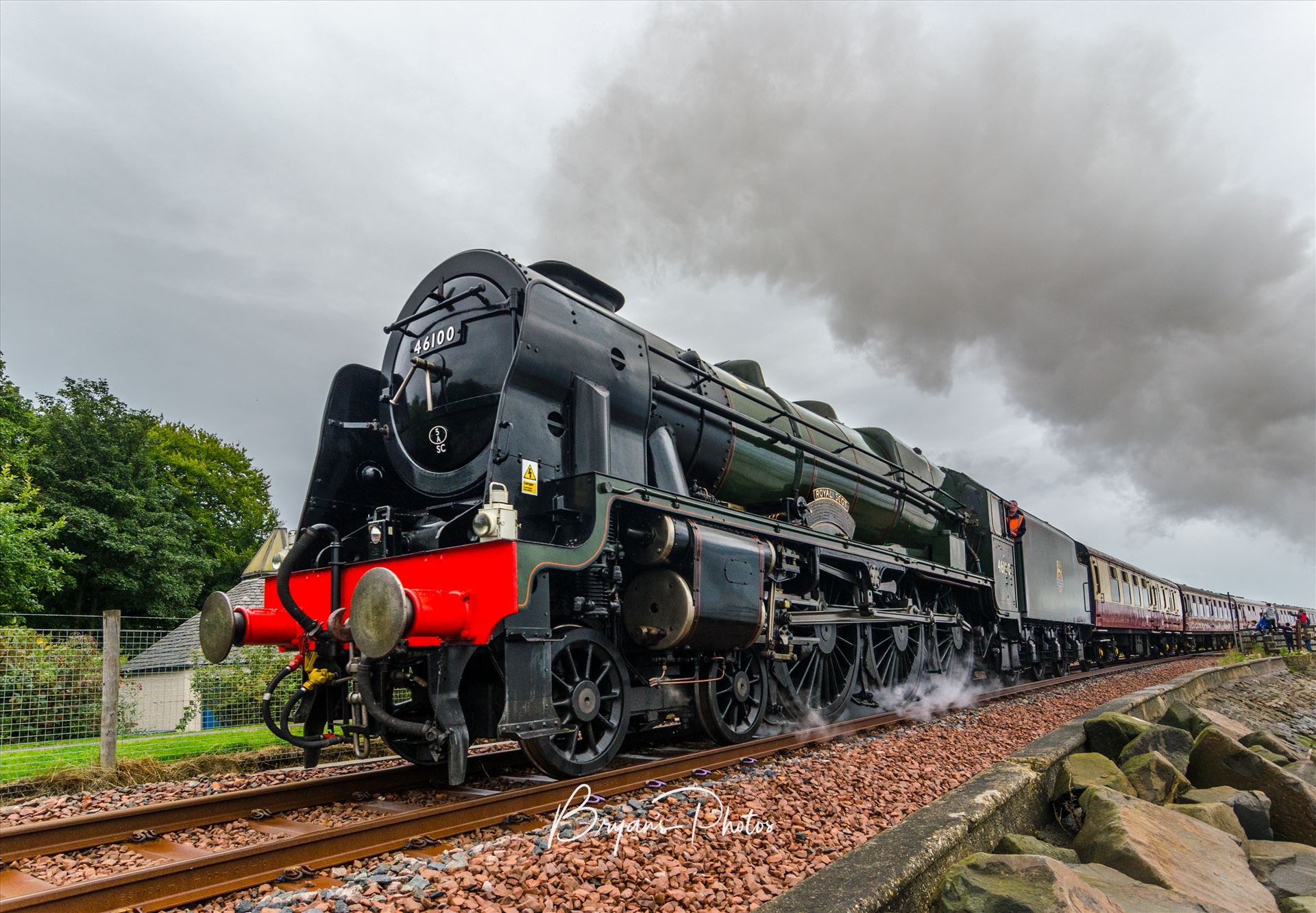 Royal Scot - A colour photograph of the Royal Scot passing through Culross as part of it's journey through Fife. by Bryans Photos