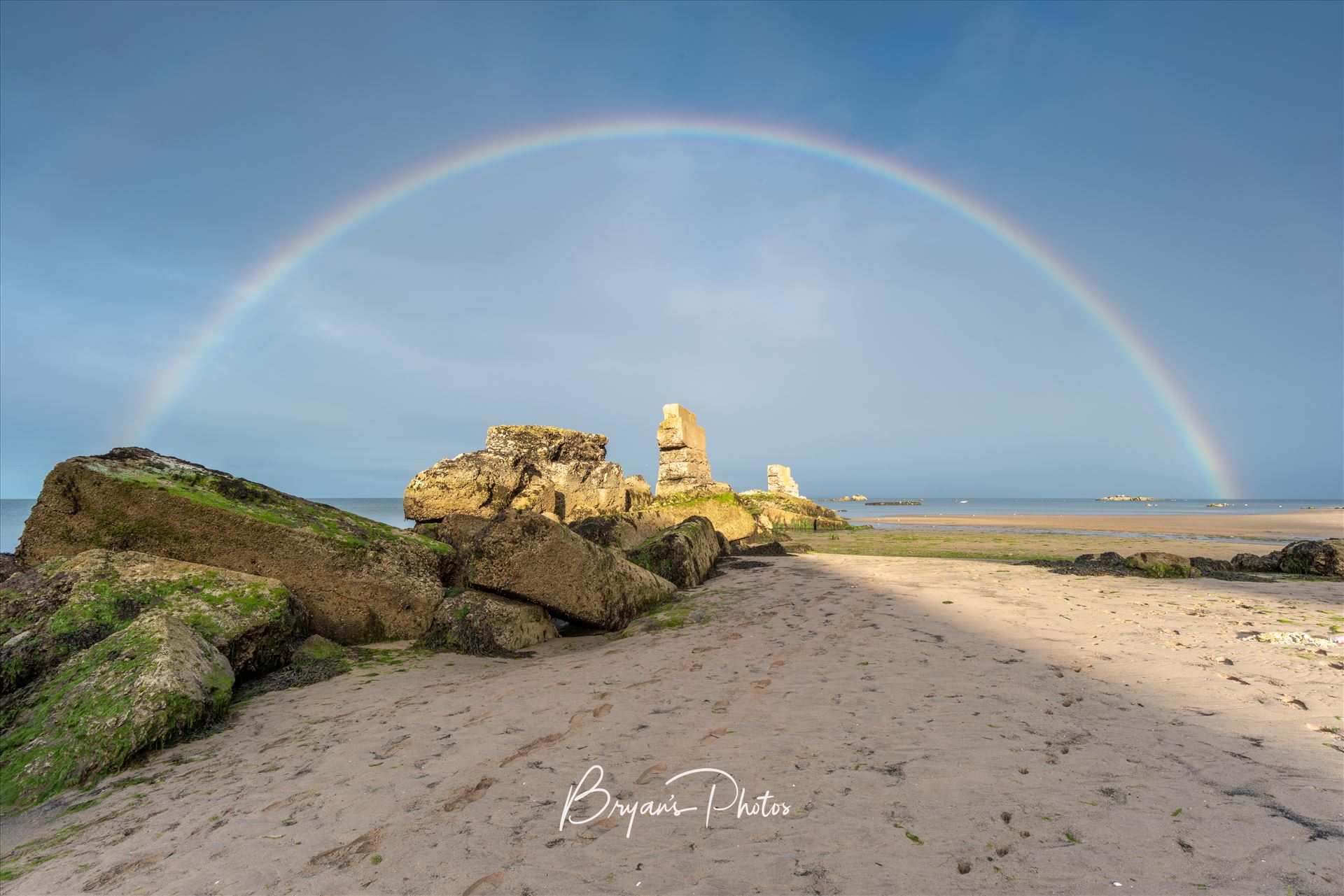 Rainbow at Seafield - A photograph of a rainbow at Seafield beach Kirkcaldy. by Bryans Photos