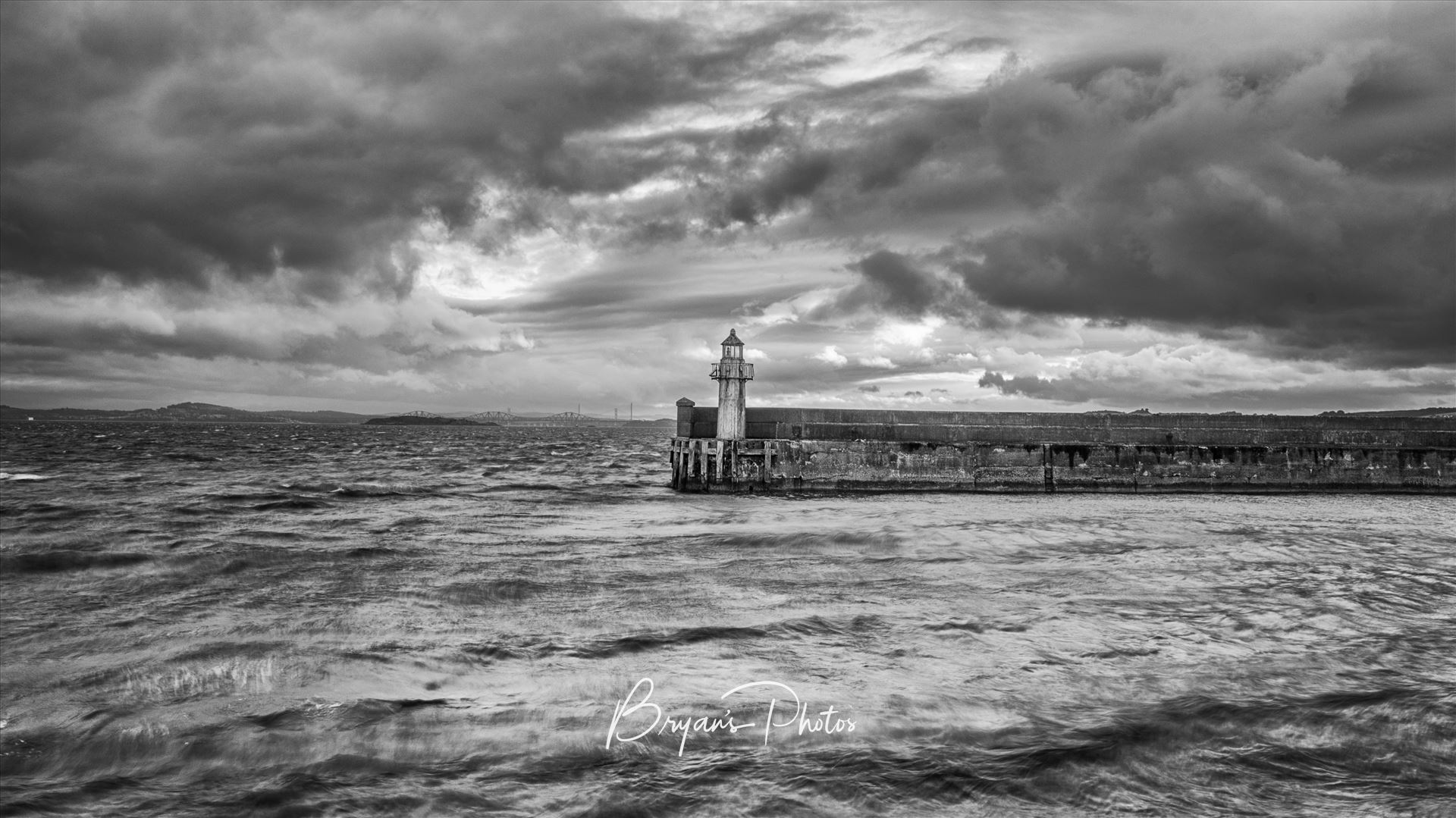 The Lighthouse - A black and white photograph of the lighthouse at Burntisland Harbour on the Fife coast. by Bryans Photos