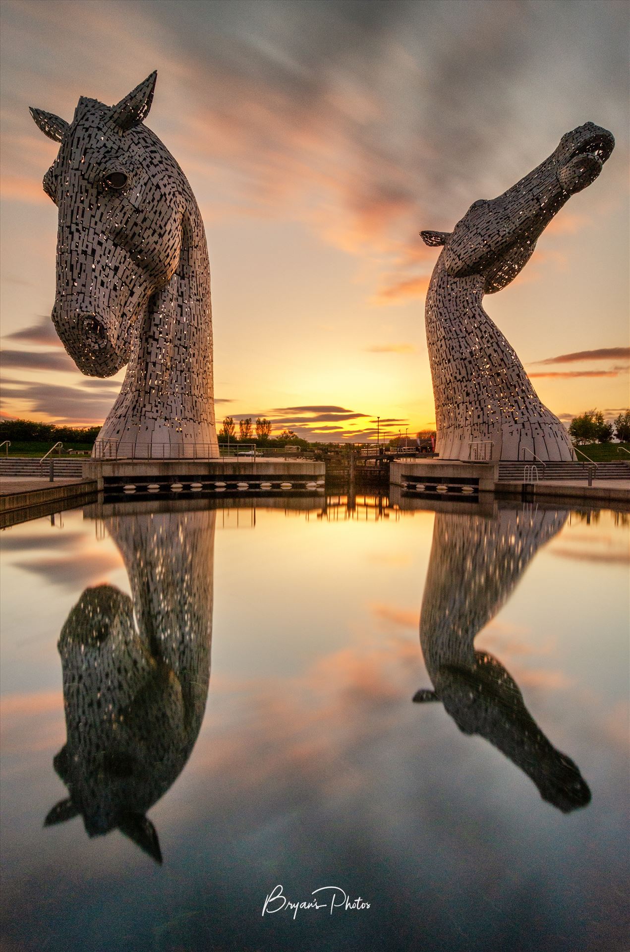 Sundown at the Kelpies - A photograph of the Kelpies taken at sundown. by Bryans Photos