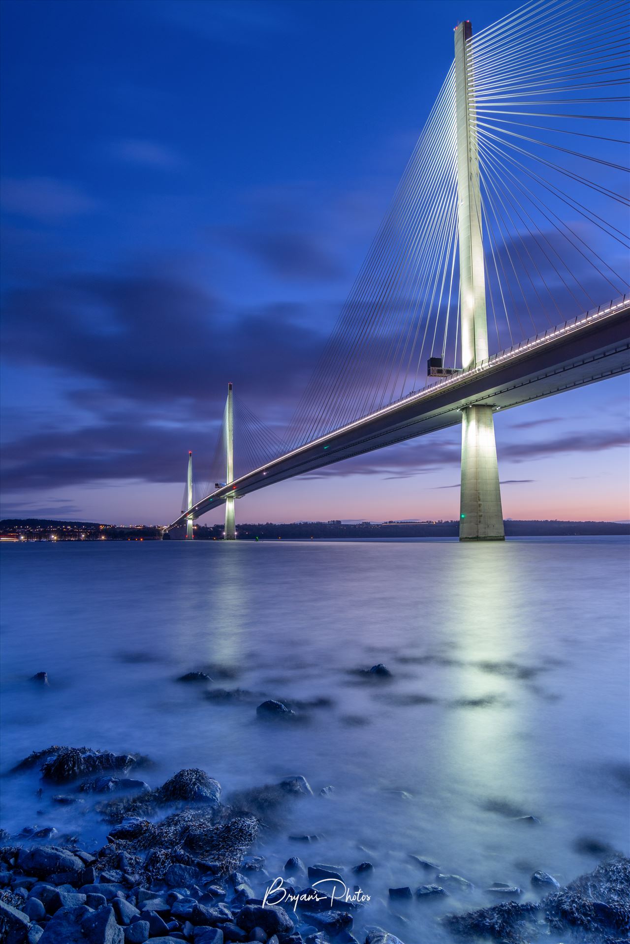 The Crossing at Night - A photograph of the Queensferry crossing at night taken from North Queensferry. by Bryans Photos