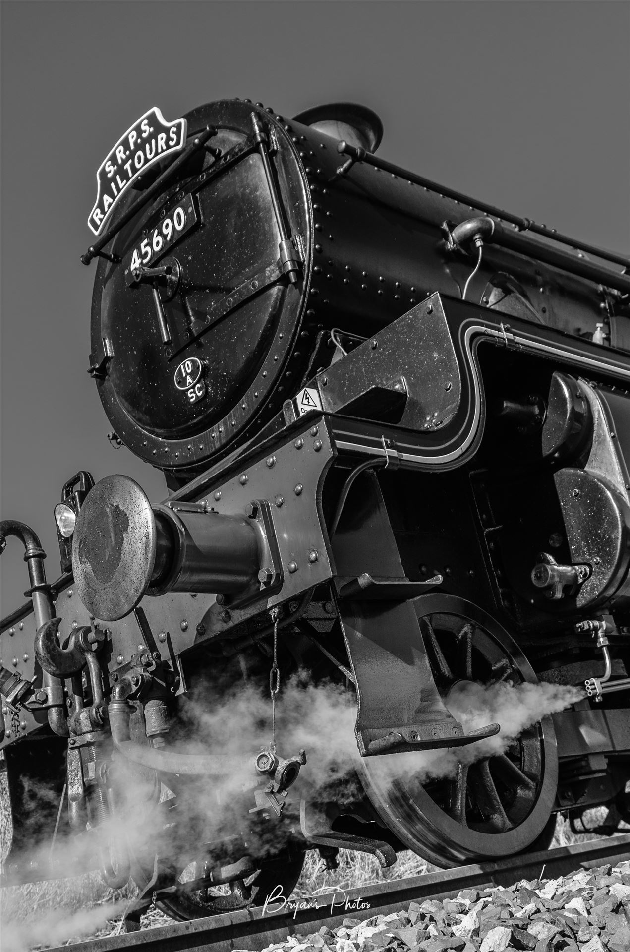 Leander Portrait - A black and white Portrait photograph of the Jubilee Class steam train Leander No.45690. by Bryans Photos