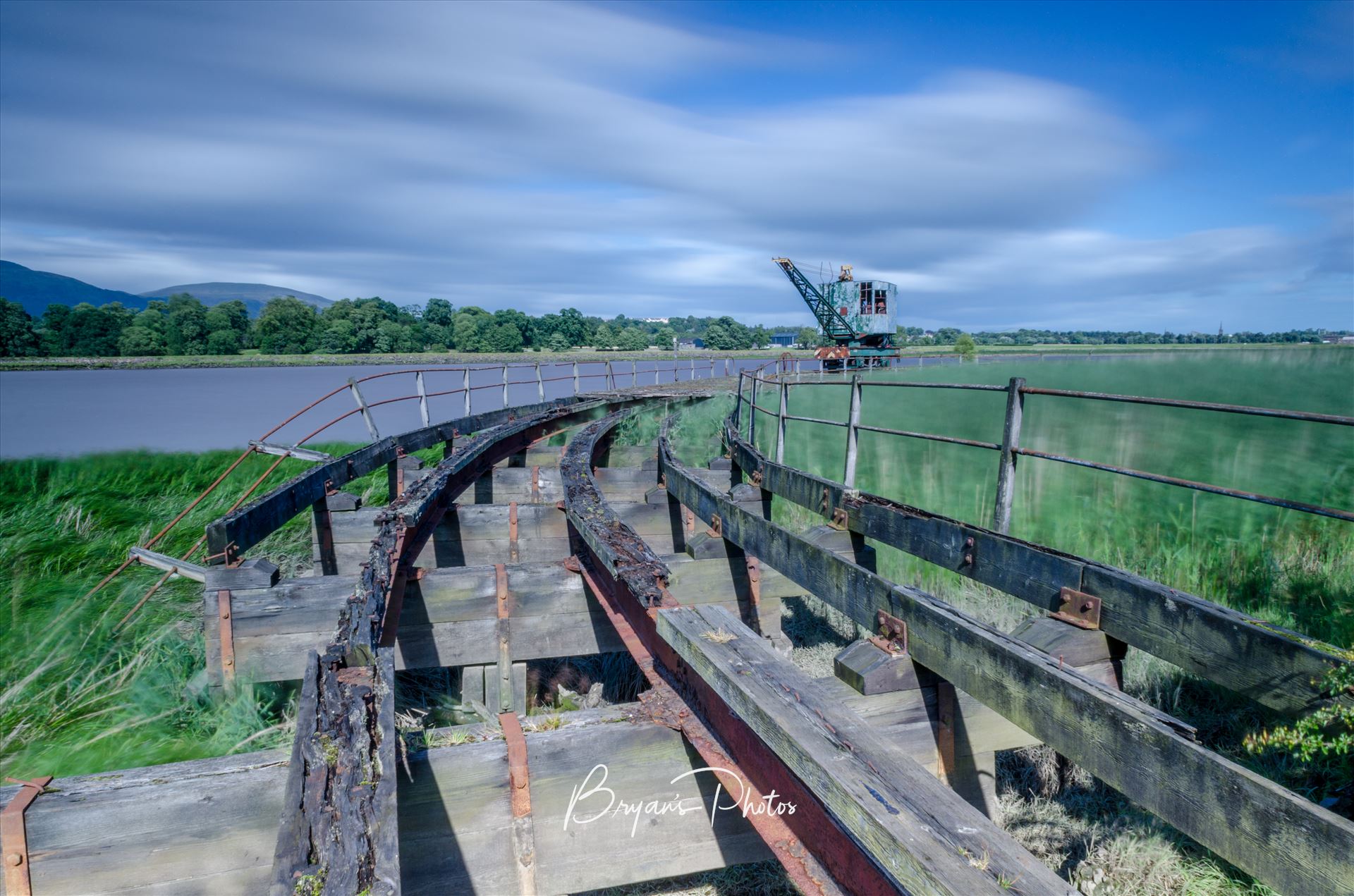 Crane at Bandeath - A long exposure photograph taken at the former Bandeath Munitions Depot on the banks of the river Forth. by Bryans Photos