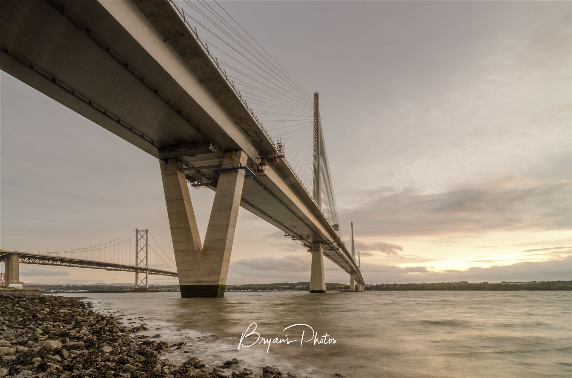 Road Bridges - A photograph of the Queensferry Crossing and Forth Road Bridge taken from the north shore of the River Forth at North Queensferry. by Bryans Photos