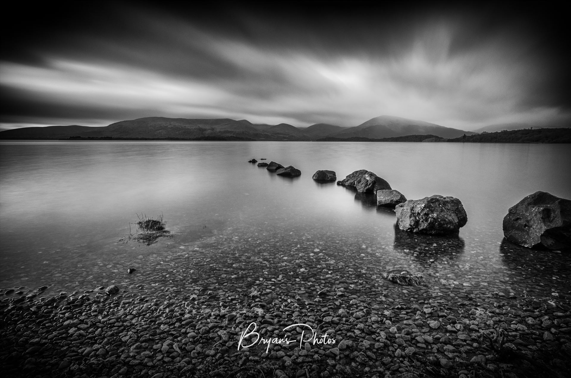 Moody Milarrochy - A black & white photograph of Loch Lomond taken from Milarrochy Bay on the eastern shore of the loch near Balmaha. by Bryans Photos