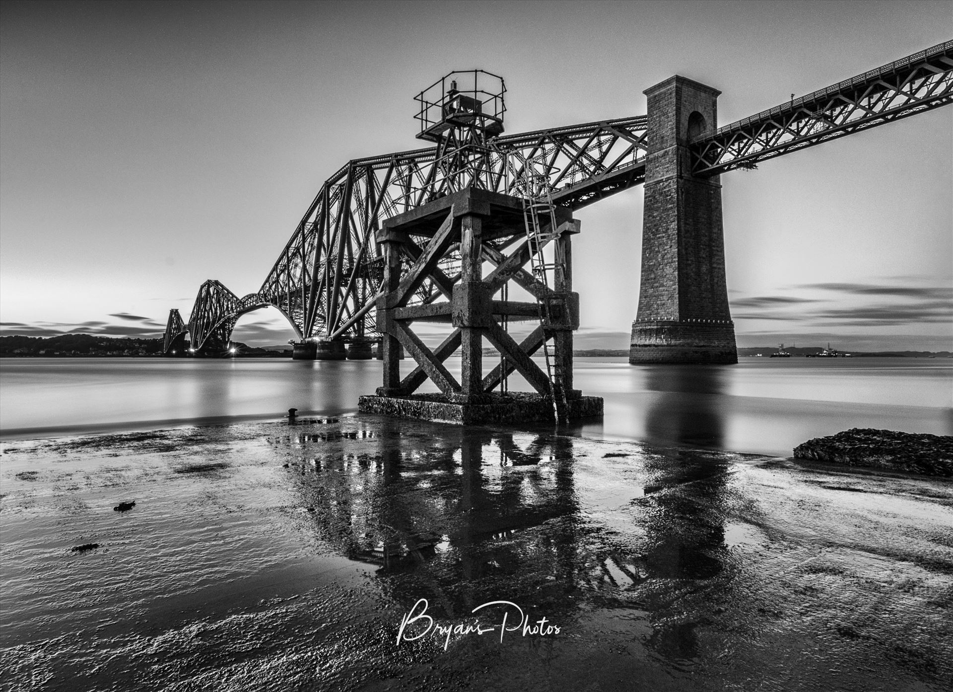 Hawes Pier - A black and white photograph of the Forth Rail Bridge taken from the End of Hawes Pier at low tide. by Bryans Photos