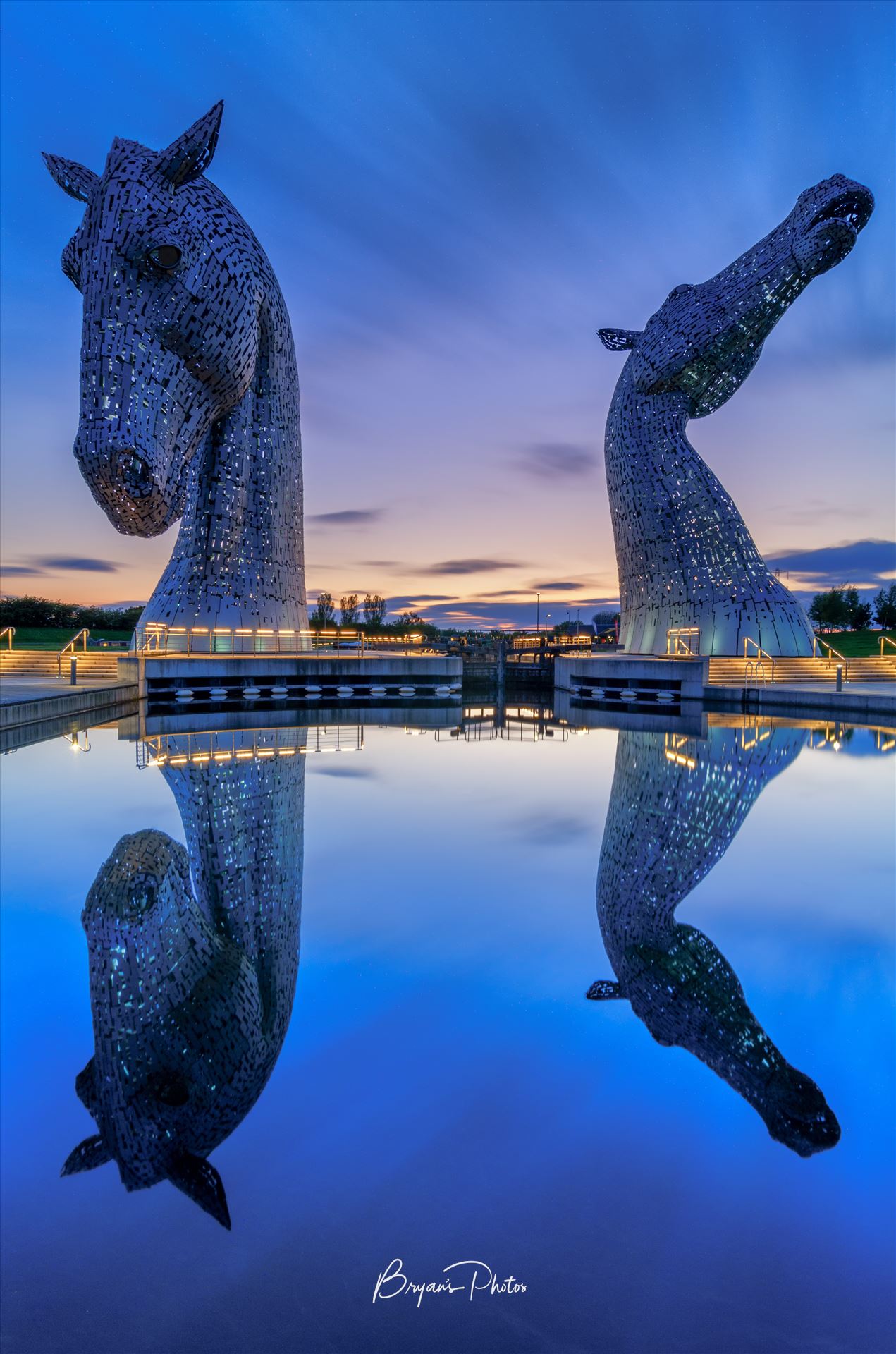 Last Light at the Kelpies - A photograph of the Kelpies taken just after sunset. by Bryans Photos