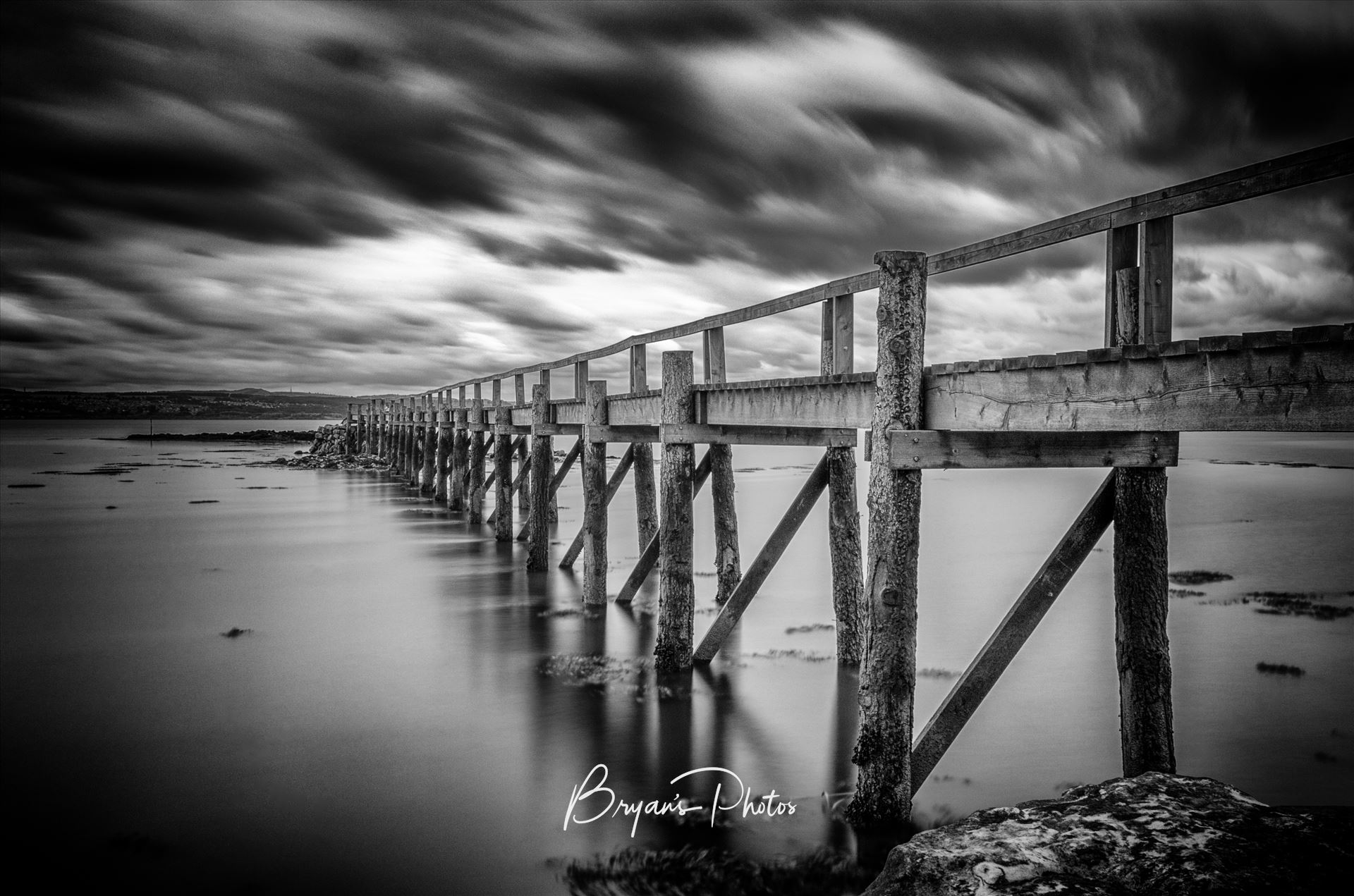 Culross - A black and white photograph of the Historic Pier at Culross on the Fife coast. by Bryans Photos