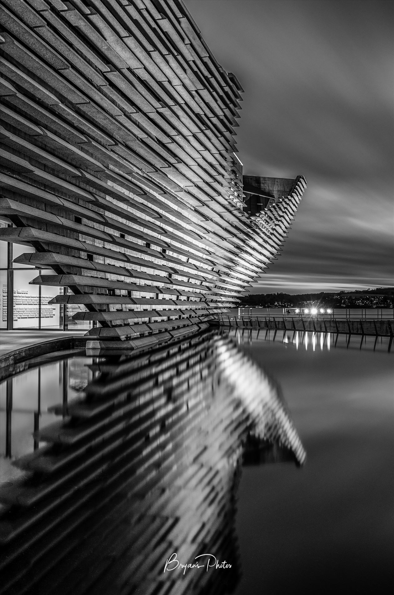 V&A Reflections - A black and white portrait photograph taken at the V&A museum Dundee. by Bryans Photos