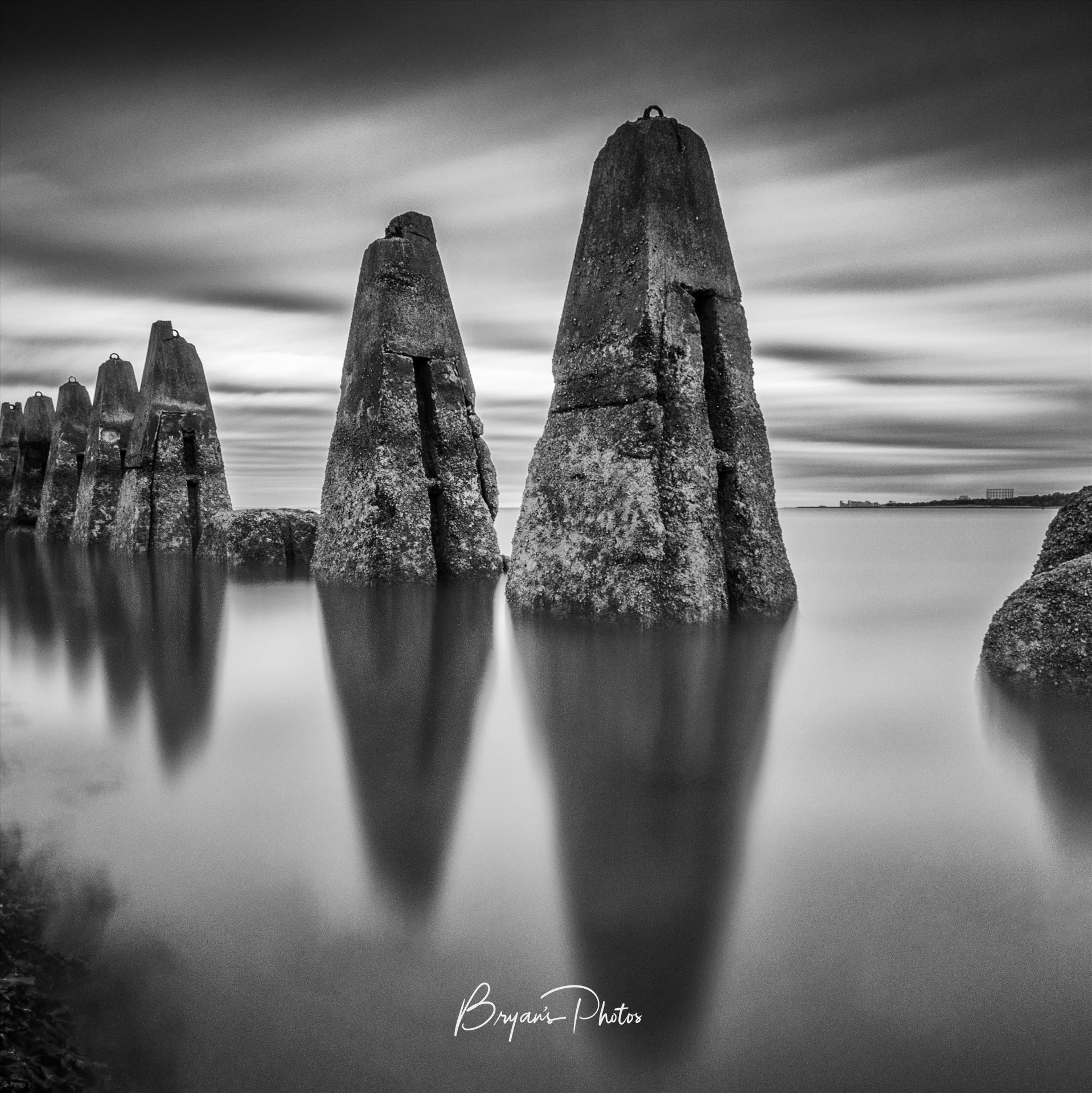 Causeway At Cramond - A black & white daytime long exposure photograph of the causeway to Cramond Island in the Firth of Forth. by Bryans Photos