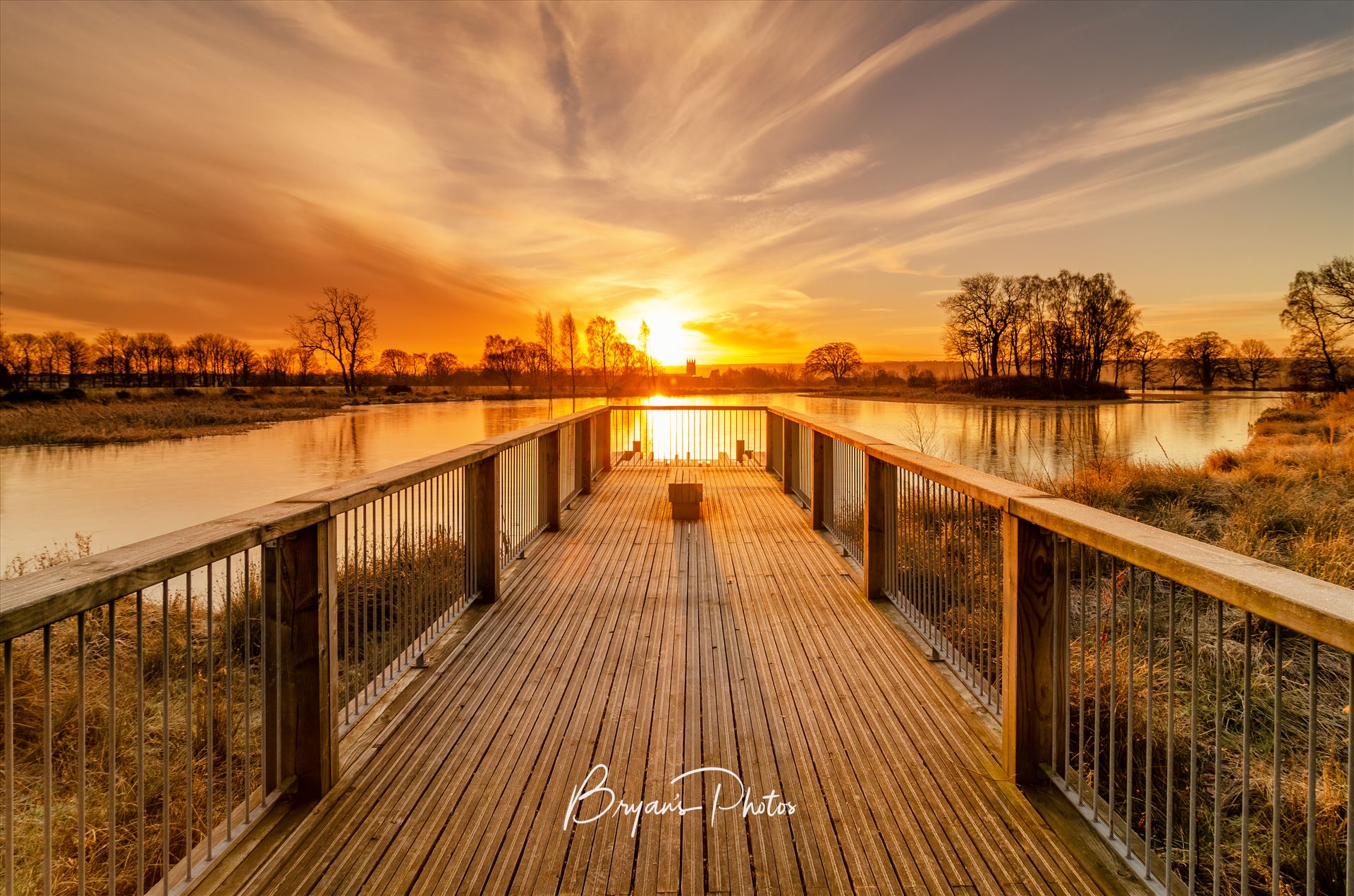 Larbert Loch Sunrise - A colour photograph of a winter sunrise taken at Larbert Loch in the grounds of Forth Valley Royal Hospital. by Bryans Photos