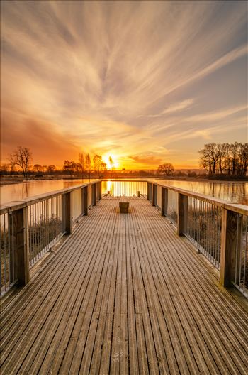 A colour photograph of a winter sunrise taken at Larbert Loch in the grounds of Forth Valley Royal Hospital.