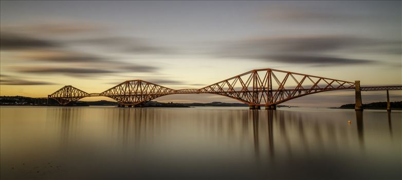 A panoramic long exposure photograph of the Forth Rail Bridge taken at sunset from South Queensferry.