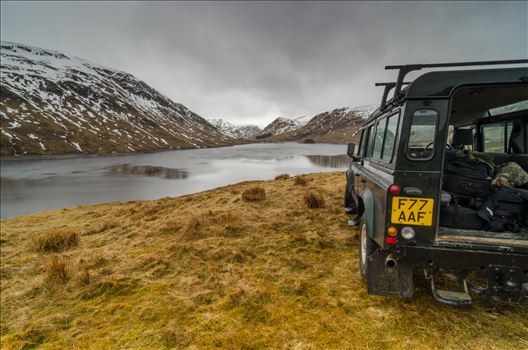 A photograph of the Glen Lyon Reservoir and the Land rover that took me there.