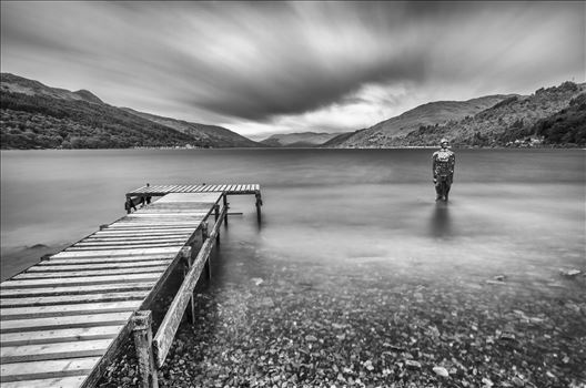 A black and white long exposure photograph of Loch Earn taken from St Fillans.