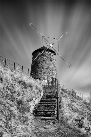 A black and white long exposure photograph of the windmill at St Monans on the Fife coast.