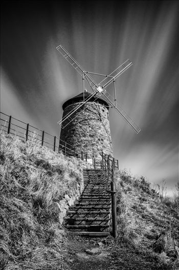 A black and white long exposure photograph of the windmill at St Monans on the Fife coast.