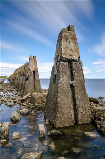 A long exposure photograph of the causeway to Cramond Island.