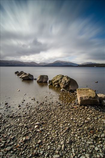 A long exposure photograph of Loch Lomond taken from Milarrochy Bay.