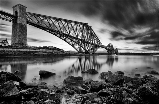 The Rail Bridge Black & White - A black and white long exposure photograph of the iconic Forth Rail Bridge taken on a summer evening from North Queensferry on the banks of the river Forth.