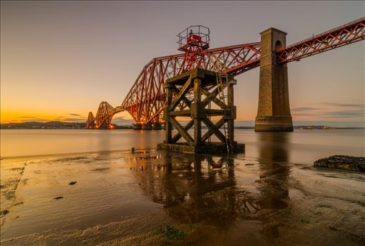 A photograph of the Forth Rail Bridge taken from Hawes Pier at Sunset.