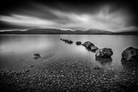 A black & white photograph of Loch Lomond taken from Milarrochy Bay on the eastern shore of the loch near Balmaha.