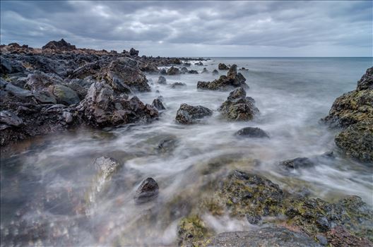 A photograph taken from the beach at Los Piccolos Lanzarote looking out over the Atlantic Ocean.